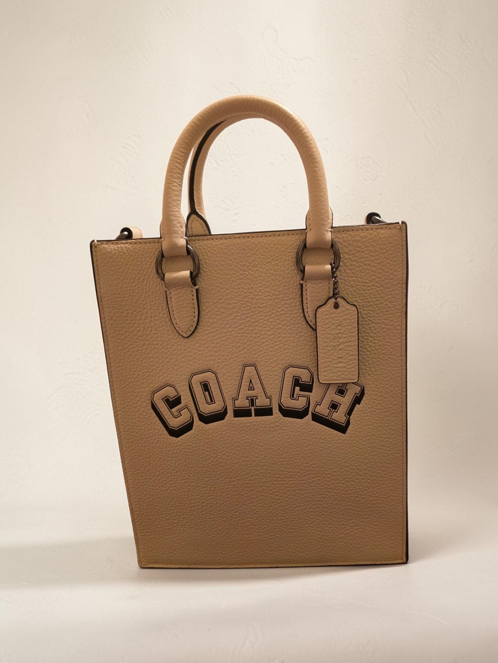 COACH Dylan Tan Pebbled Leather Logo Tote